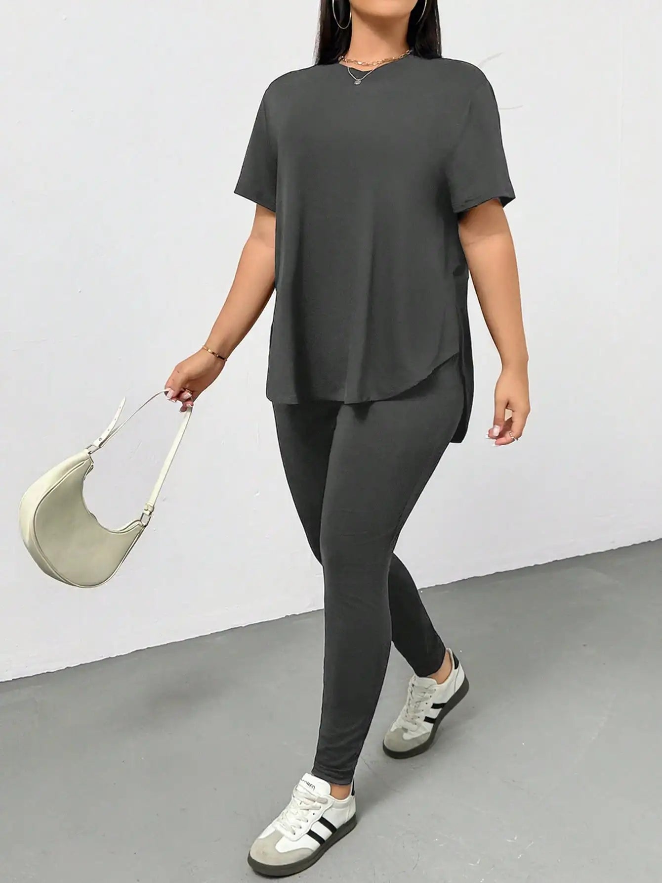 Plus Size Black 2-Piece Set: Comfortable Slit T-Shirt & Leggings for Streetwear, Summer Outfits.