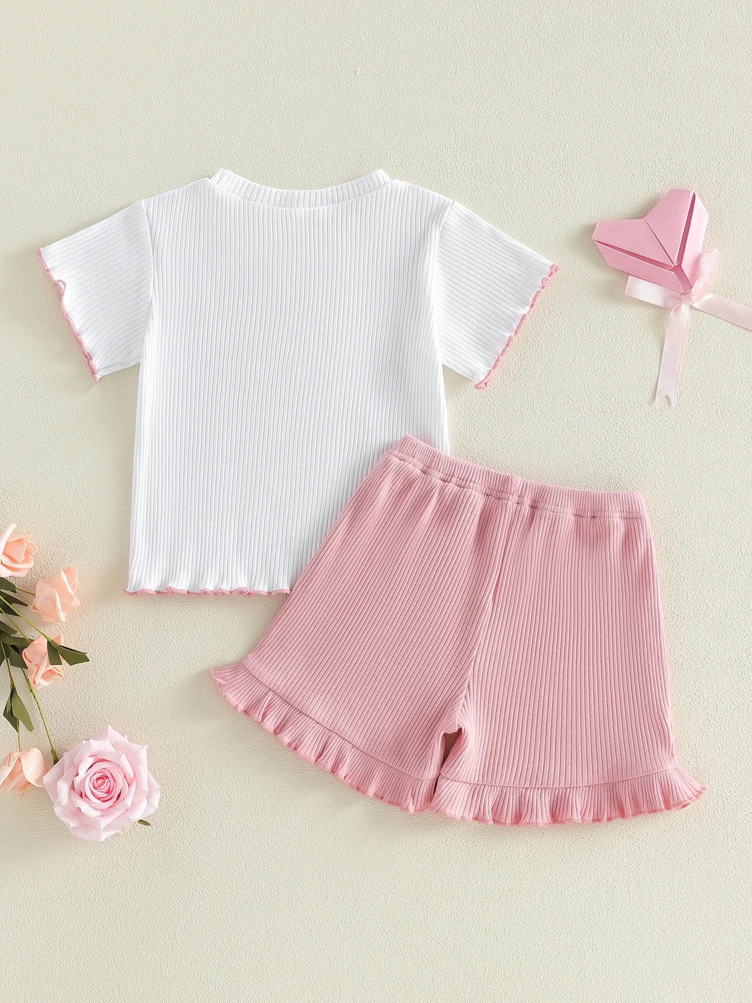 Stylish Girls 2 Piece Set with Adorable Bow Detailing Short Sleeve Top and Matching Shorts in Round Neck Design