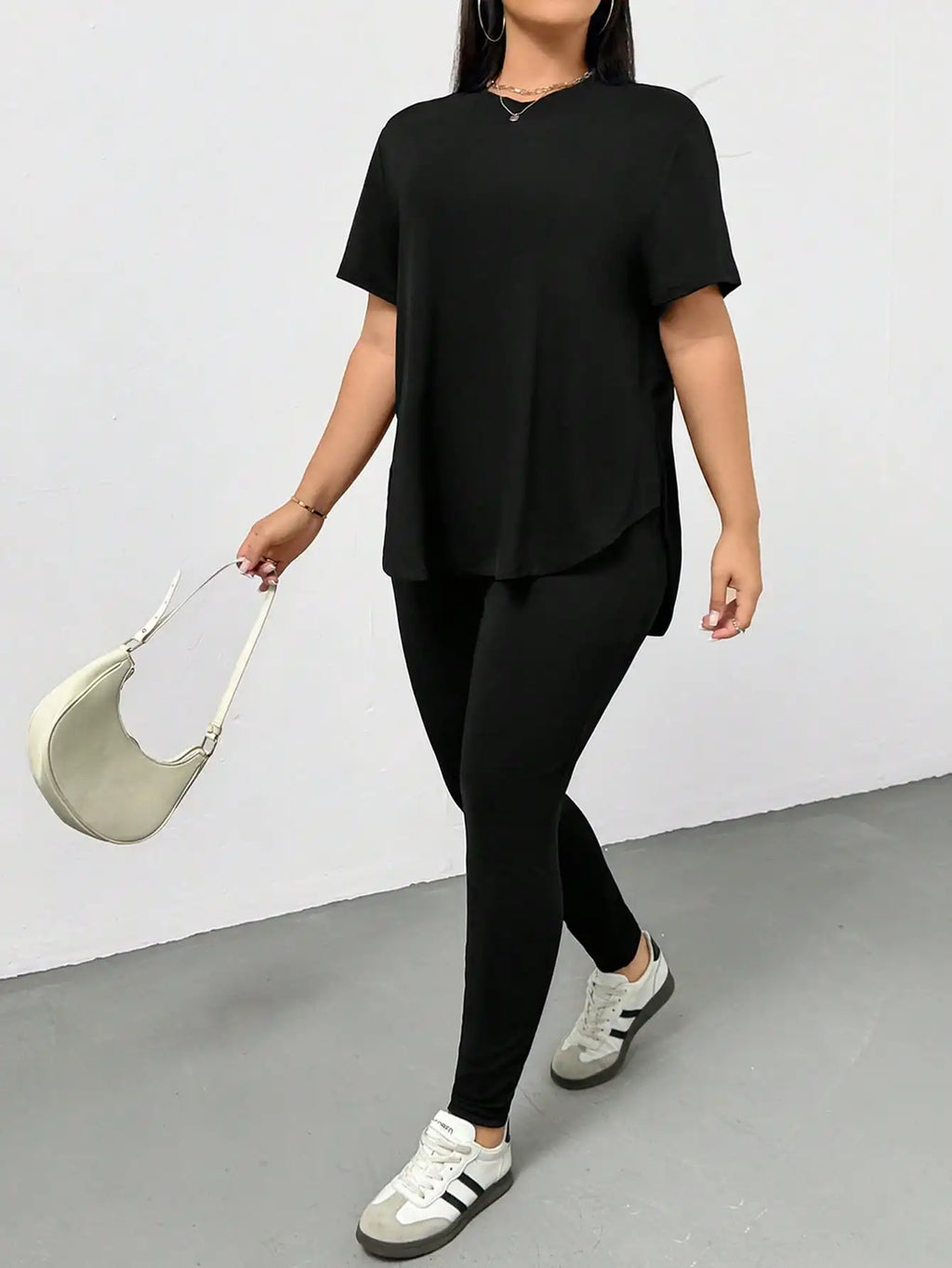 Plus Size Black 2-Piece Set: Comfortable Slit T-Shirt & Leggings for Streetwear, Summer Outfits.
